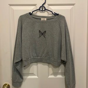 cropped, grey, butterfly crew neck. barely worn and the inside is super soft!